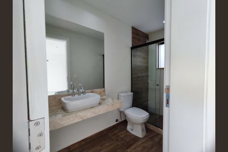 Casa de condomínio para alugar com 315m², 4 quartos e 2 vagasBanheiro da Suíte 1