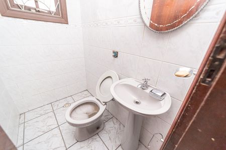 Casa à venda com 230m², 4 quartos e 4 vagas Casa à venda com 230m², 4 quartos e 4 vagasbanheiro da Garagem