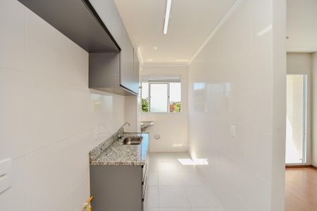 Apartamento à venda com 45m², 2 quartos e 1 vaga Apartamento à venda com 45m², 2 quartos e 1 vagaCozinha e Área de Serviço