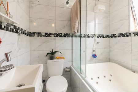 Casa à venda com 154m², 3 quartos e 3 vagasBanheiro Suíte 1