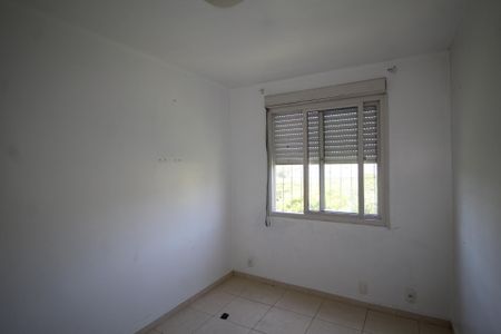 Quarto 1 de apartamento para alugar com 2 quartos, 47m² em Morro Santana, Porto Alegre