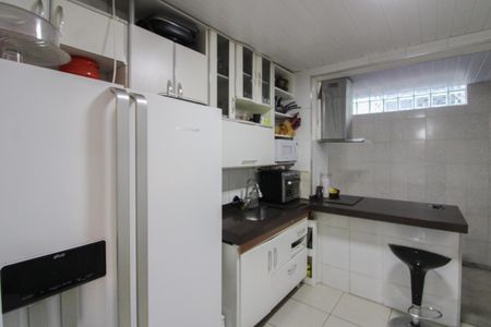 Casa à venda com 240m², 4 quartos e 4 vagas Casa à venda com 240m², 4 quartos e 4 vagasCozinha