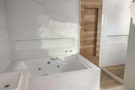 Casa de condomínio à venda com 350m², 4 quartos e 3 vagas