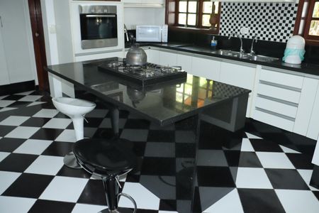 Casa de condomínio para alugar com 400m², 5 quartos e 4 vagasCozinha