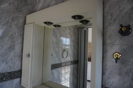 Casa para alugar com 416m², 4 quartos e 6 vagasBanheiro da Suíte 1