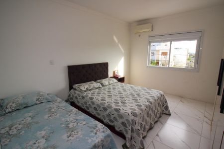 Suíte 1 de casa à venda com 2 quartos, 93m² em Guarujá, Porto Alegre