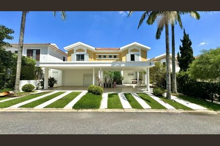 Casa de condomínio à venda com 330m², 4 quartos e 4 vagasFoto 01