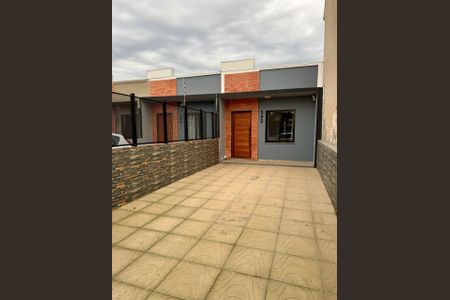 Casa à venda com 56m², 2 quartos e 2 vagasFoto 01