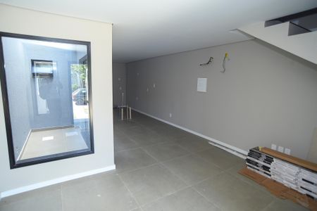 Sala de casa de condomínio para alugar com 2 quartos, 92m² em Mário Quintana, Viamão