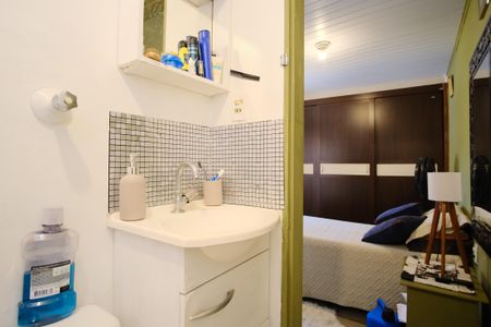 Casa à venda com 450m², 7 quartos e 6 vagasBanheiro da Suíte 2 da Casa 1