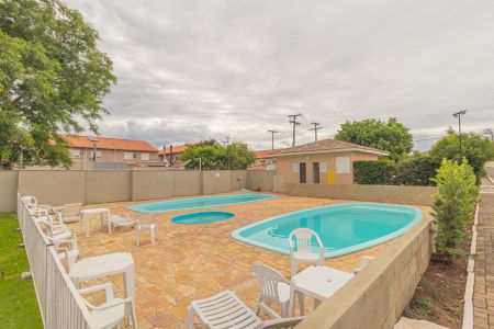 Casa de condomínio à venda com 103m², 2 quartos e 2 vagasÁrea comum - Piscina