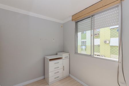 Quarto 1 de apartamento para alugar com 2 quartos, 52m² em Vila Nova, Porto Alegre