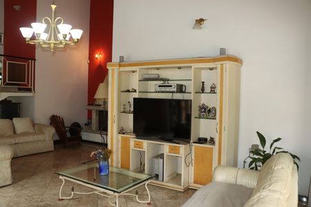 Casa de condomínio para alugar com 1100m², 4 quartos e 6 vagasSala