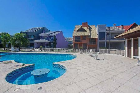 Casa de condomínio à venda com 200m², 4 quartos e 5 vagasÁrea comum - Piscina