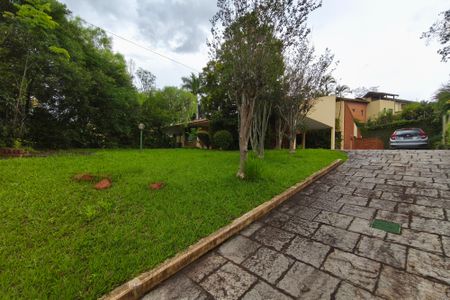 Casa de condomínio à venda com 504m², 4 quartos e 4 vagasQuintal - Garagem