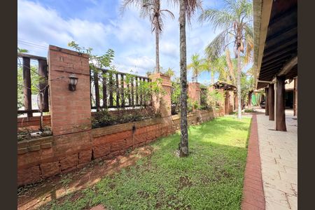 Casa de condomínio para alugar com 717m², 5 quartos e 6 vagas