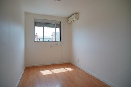 Quarto suíte  de apartamento para alugar com 2 quartos, 52m² em Passo das Pedras, Porto Alegre