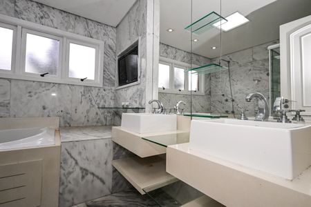 Casa de condomínio para alugar com 375m², 7 quartos e 4 vagasBanheiro Suíte 1