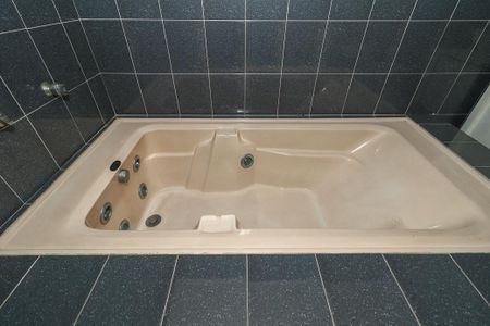 Banheiro da Suíte de casa à venda com 3 quartos, 178m² em Jardim Itu, Porto Alegre