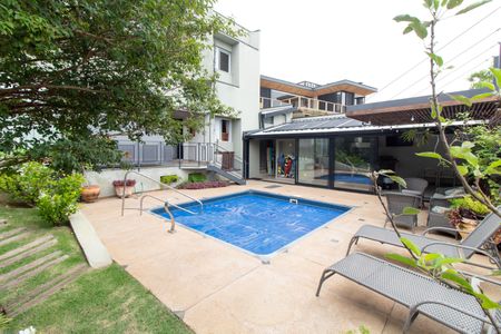 Casa de condomínio à venda com 421m², 4 quartos e 4 vagasÁREA EXTERNA 