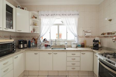 Casa à venda com 93m², 2 quartos e 2 vagasCozinha e Área de Serviço