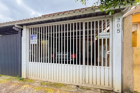 Casa à venda com 180m², 6 quartos e 2 vagasFachada + Plaquinha