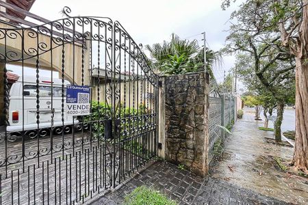 Casa à venda com 293m², 3 quartos e 5 vagasFachada + plaquinha