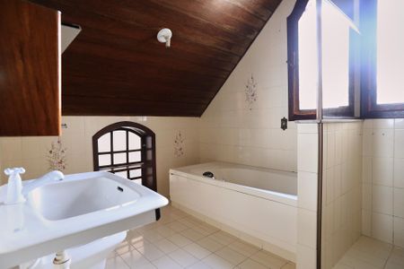 Casa à venda com 400m², 7 quartos e 4 vagasBanheiro da Suíte 1