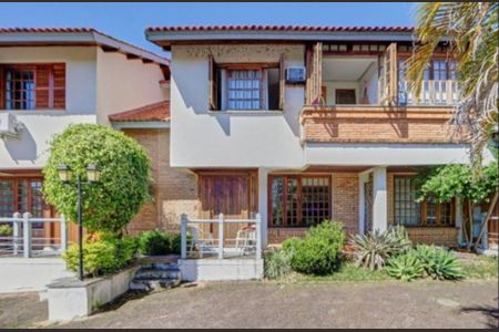 Foto 01 de casa de condomínio à venda com 3 quartos, 135m² em Ipanema, Porto Alegre