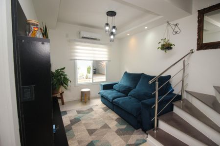 Sala de casa de condomínio à venda com 4 quartos, 158m² em Ipanema, Porto Alegre