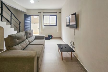 Sala de casa para alugar com 2 quartos, 70m² em Balneario Praia do Perequê, Guarujá