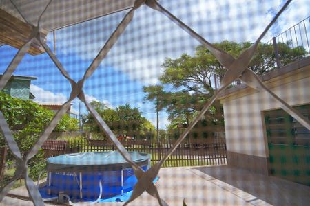 Quarto  1 -VISTA  de casa à venda com 5 quartos, 535m² em Vila Nova, Porto Alegre