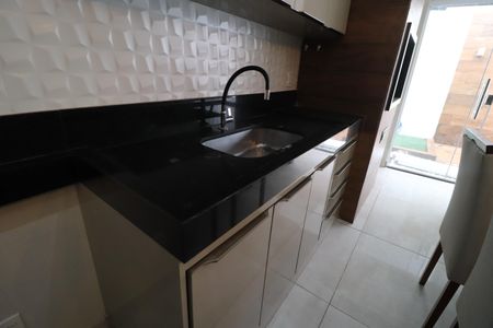 Casa de condomínio para alugar com 140m², 4 quartos e 2 vagasCozinha