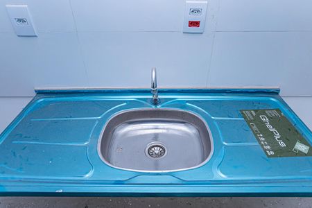 Sala, cozinha e área de serviço de apartamento à venda com 2 quartos, 48m² em Piqueri, São Paulo