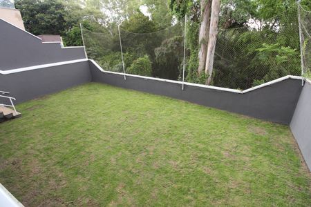 Casa de condomínio para alugar com 239m², 4 quartos e 4 vagasQuintal