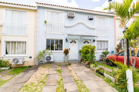 Casa de condomínio à venda com 80m², 2 quartos e 1 vagaFachada