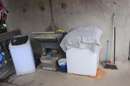 Casa à venda com 215m², 4 quartos e 3 vagasVaranda e lavanderia 1