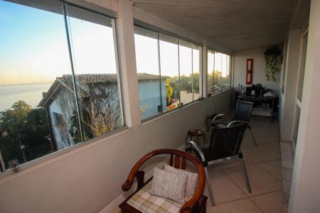 Sacada da Sala de Jantar de casa à venda com 3 quartos, 275m² em Sétimo Céu, Porto Alegre