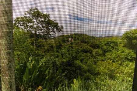 Casa de condomínio à venda com 472m², 5 quartos e 3 vagas Casa de condomínio à venda com 472m², 5 quartos e 3 vagasVista do Quarto Externo 1