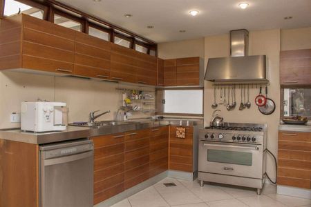 Casa de condomínio à venda com 611m², 4 quartos e 4 vagas