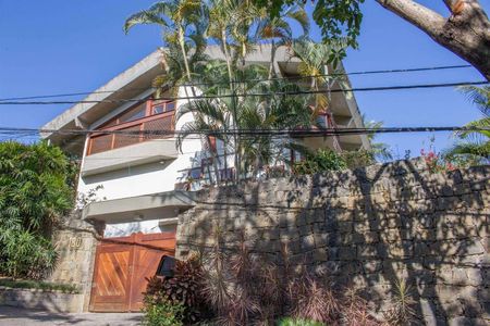 Casa de condomínio à venda com 611m², 4 quartos e 4 vagas