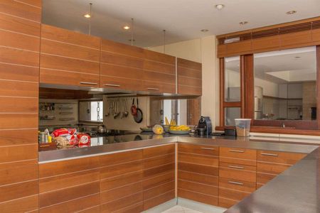 Casa de condomínio à venda com 611m², 4 quartos e 4 vagas