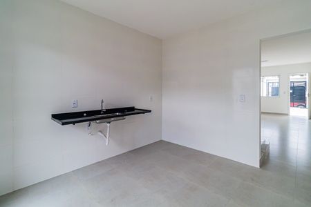 Casa à venda com 76m², 2 quartos e 2 vagas Casa à venda com 76m², 2 quartos e 2 vagasCozinha