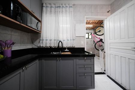 Casa de condomínio à venda com 83m², 2 quartos e 3 vagasCozinha e Área de Serviço