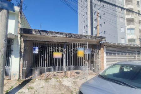 Casa à venda com 120m², 2 quartos e 1 vagaFachada do imóvel com placa QuintoAndar
