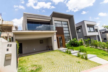 Casa de condomínio à venda com 387m², 4 quartos e 5 vagas Casa de condomínio à venda com 387m², 4 quartos e 5 vagasVista da Rua