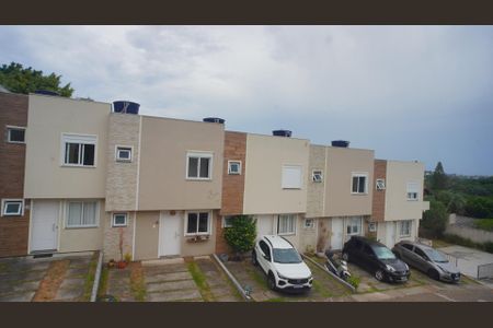 Casa de condomínio à venda com 87m², 3 quartos e 2 vagasVista da Rua
