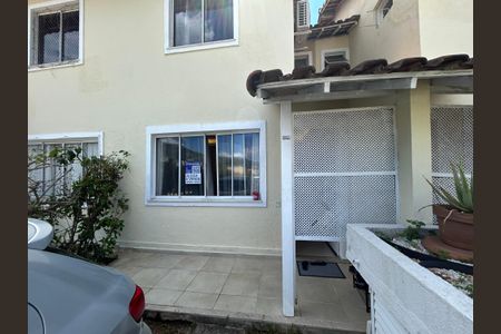 Casa de condomínio à venda com 65m², 2 quartos e 2 vagasFachada + plaquinha