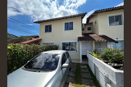 Casa de condomínio à venda com 65m², 2 quartos e 2 vagasFachada + plaquinha
