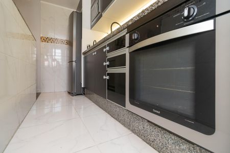 Casa à venda com 78m², 2 quartos e 2 vagas Casa à venda com 78m², 2 quartos e 2 vagasCozinha